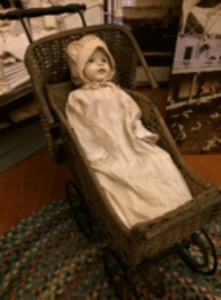 Bisque Doll / Wicker Buggy